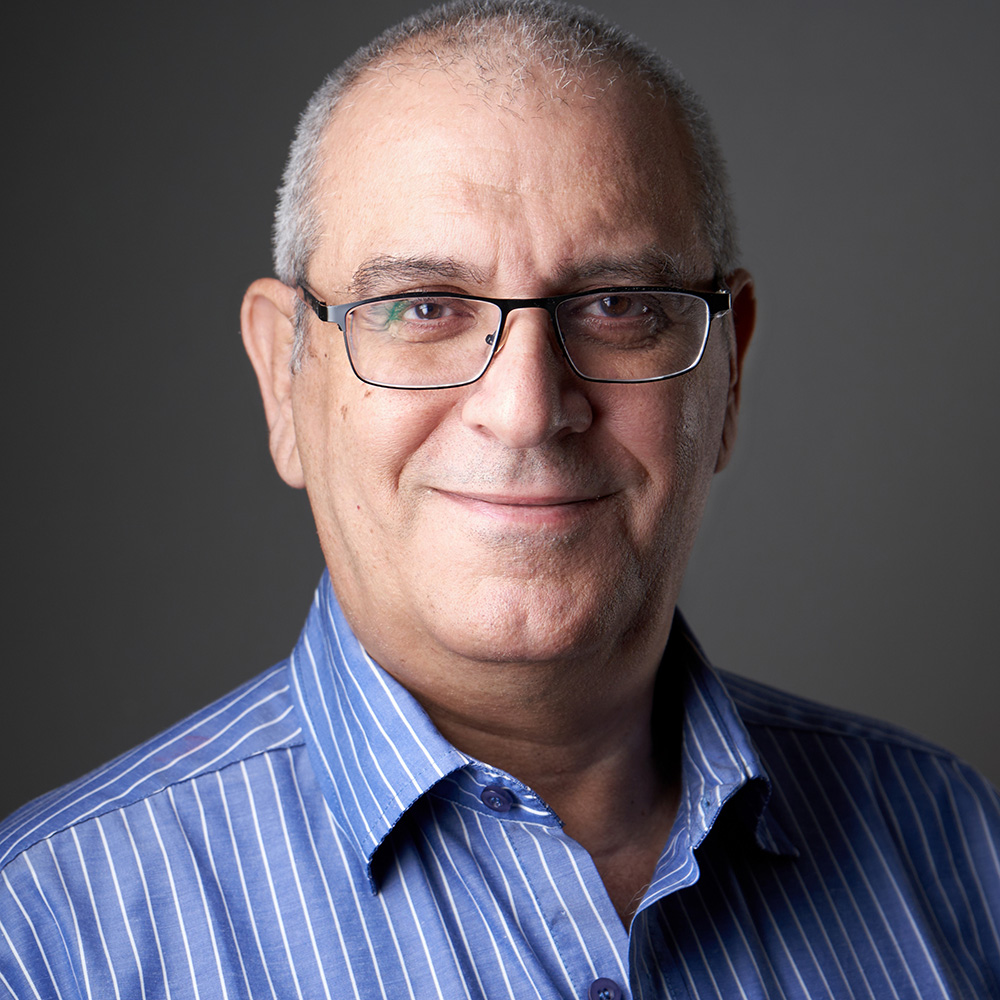 Hany, who works alongside Violet Gorgi on corporate headshot sessions in Indiana